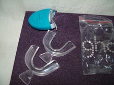 teeth whitening replacement trays and laser light