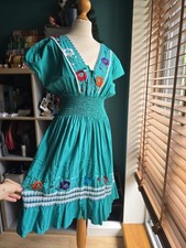 Mexican traditional embroidered teal dress. Olavera Street Los Angeles. Handmade