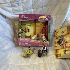 Disney Micro world house with 5  figures used 
