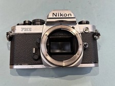 Original vintage Nikon FM2N SLR Camera. With 28-135mm Zoom Sigma Lens.