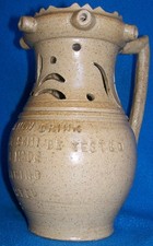 ANTIQUE STONEWARE PUZZLE JUG