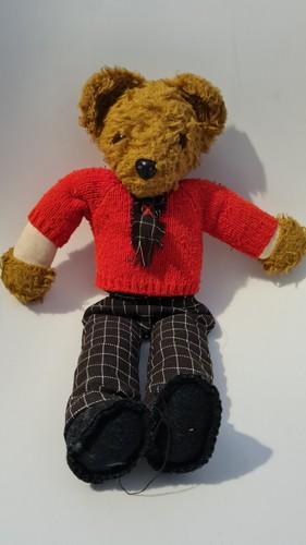 1970 teddy bear wearing a - teddy,