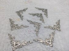 8 silver tone metallic book