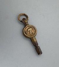 SMALL KEY FOR VINTAGE / ANTIQUE POCKET WATCH - BRASS TONE TOP & NUMBER 7 THEREON