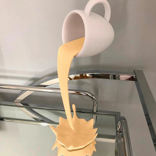 Floating spilling coffee cup - spilling,