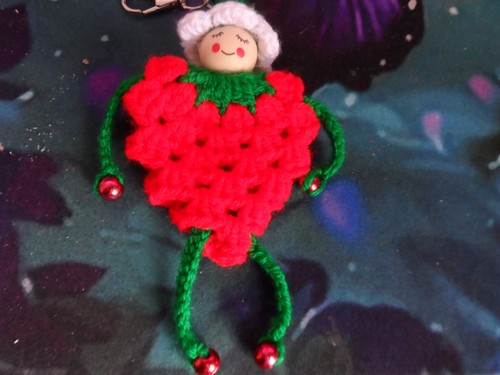 Hand crochet strawberry doll - hand,