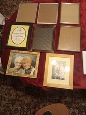 8 new 8inch x 10 inch photo frames, ex stock from a camera shop.