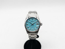 000 rolex 31mm - $10,000, midsize
