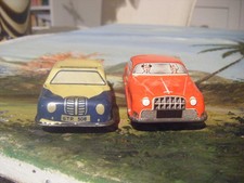 TWO Vintage GLAM TOY CARS Tinplate Blue & Yellow Police Car GTP  508 + 571 red