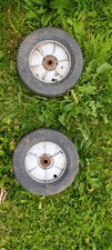 A Pair Of Rover Lawnmower Drive Wheels