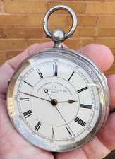 A LARGE ANTIQUE SOLID SILVER CHRONOGRAPH “T. RUSSELL, LIVERPOOL” POCKET WATCH..