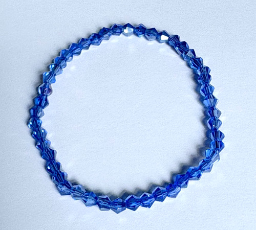 Dark blue coloured faceted - dark,