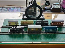 Hornby OO-Gauge "Smokey Joe" 0-4-0 Tank Loco, plus mixed 6-car train. Unboxed.