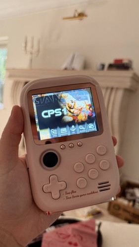 Pink handheld game console - game, +