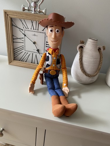 Toy story talking woody doll - story,