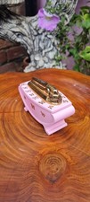 A Tarted Up Old Ronson Varaflame Table Lighter In Powder Pink And Butterflies .