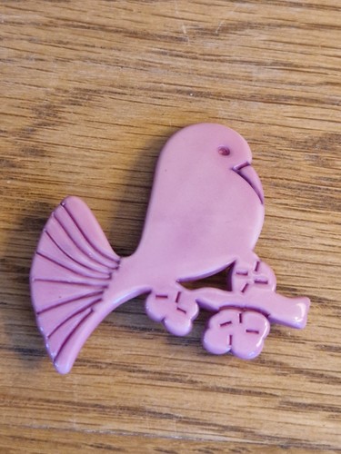 Vintage mauve plastic bird