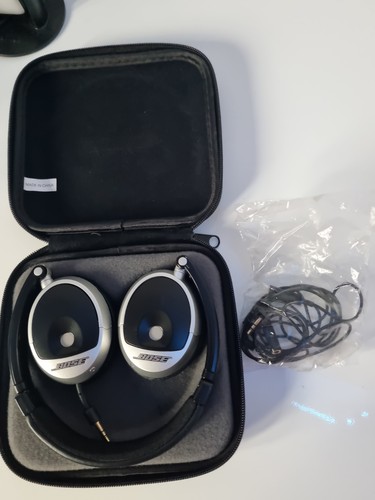 Bose ear headphones with - on,