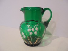 VINTAGE EMERALD GREEN GLASS JUG WITH LILY OF THE VALLEY OVERLAY - HEIGHT 3¼"