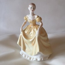 COALPORT LADIES OF FASHION FIGURINE EMILY BONE CHINA MADE IN ENGLAND. LOOKS NICE