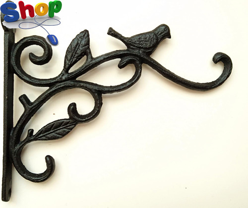 Cast iron ornate bird hanging - cast,