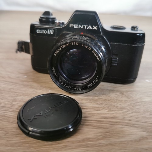 Pentax 110 auto - super., 24mm