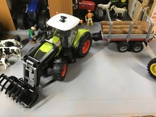 Bruder 1:16 Claas Axion 950 Tractor with Front Loader and Logging Trailer.