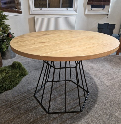 Modern round dining - table, with