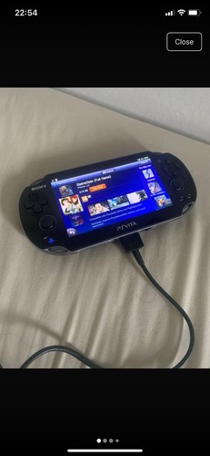 Psvita with original charger - original,