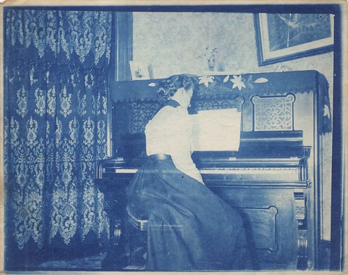 Young woman playing upright - playing,