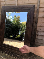 mirror with dark brown wooden surround 98cm x 75cm