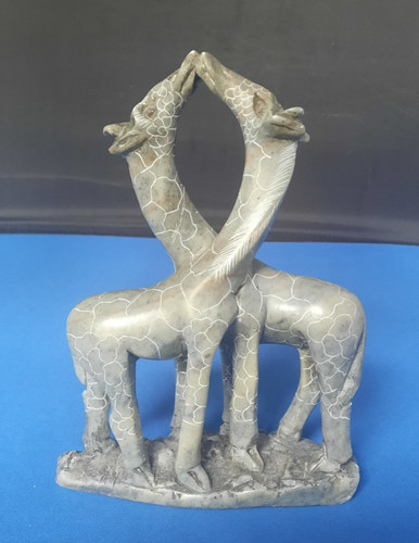 Hand carved kissing giraffe - kissing,
