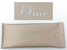 Dior gold glasses case spring squeeze soft sunglasses pouch slim one-handed
