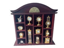12 Miniature Clocks in  Polished  Wood Display Case all Clocks  Working