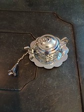 Dinky White Metal Tea Strainer In Shape Of Tea Pot On A Tray
