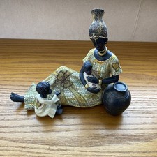 African Lady With 2 children