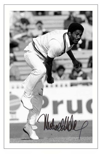 Michael holding signed - michael,
