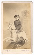 Young child with hat on spring