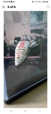 Cars in display cases - f1,