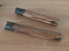 TWO WOODEN VINTAGE DOLLY PEGS WITH METAL BANDING