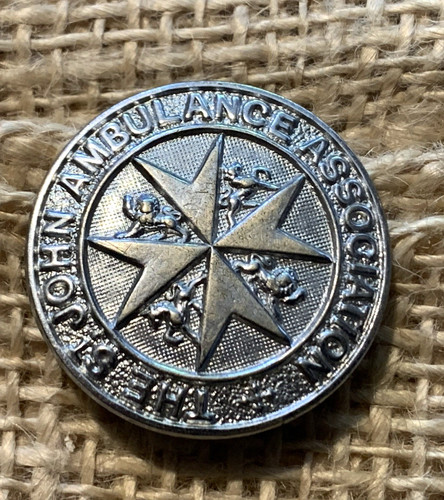 Johns ambulance cap badge - ambulance,
