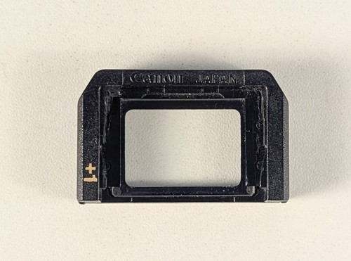 Canon dioptric adjustment lens - canon,
