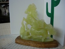 pair of jade wild horses mounted on wooden base