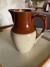 Stonewear Two Colour Tan and Sand Coloured Jug. Makers Mark on Base Height 19cm