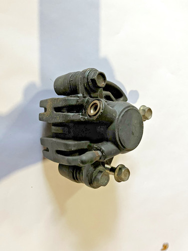 Front brake caliper - front, with
