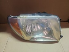 HEADLIGHT MITSUBISHI SHOGUN