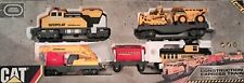 Motorised Toy Construction Train Set With Track with CAT logo.