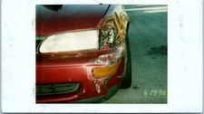 1998 Polaroid Front Corner Red