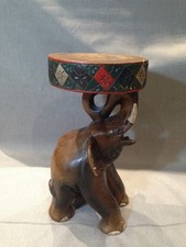 A carved solid wooden elephant table plant stand / side-table