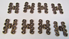Decorative hinges.  Four pairs